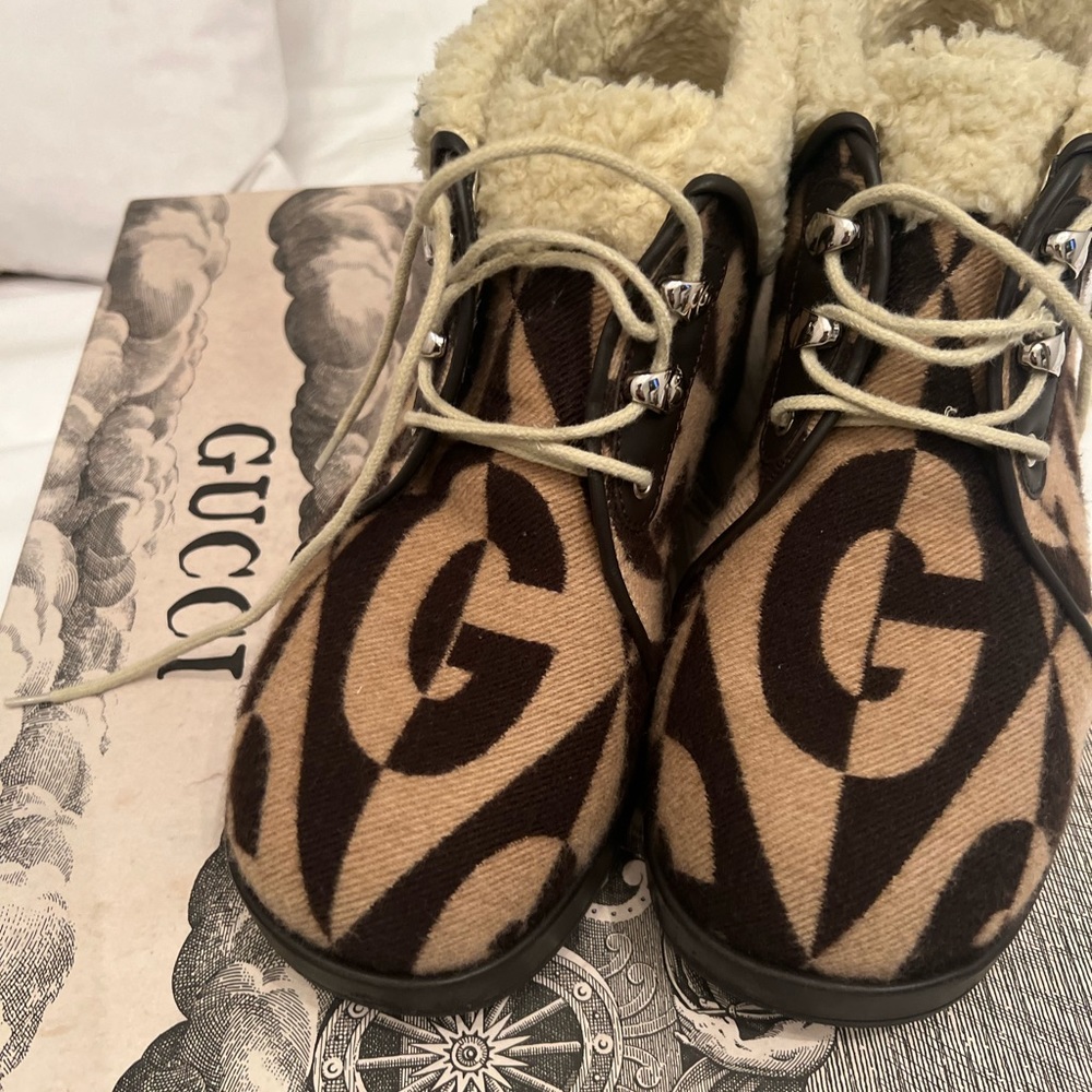 Gucci monogram boots with fur